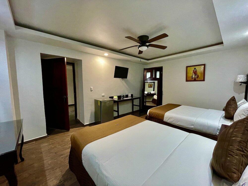 Foto de una habitación de Hotel Puebla Plaza