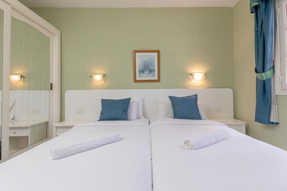 Foto de una habitación de Aparthotel Club Vista Serena
