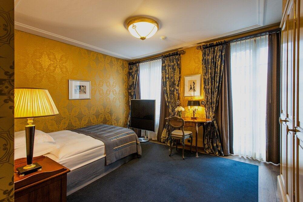 Foto de una habitación de Grand Hotel Les Trois Rois