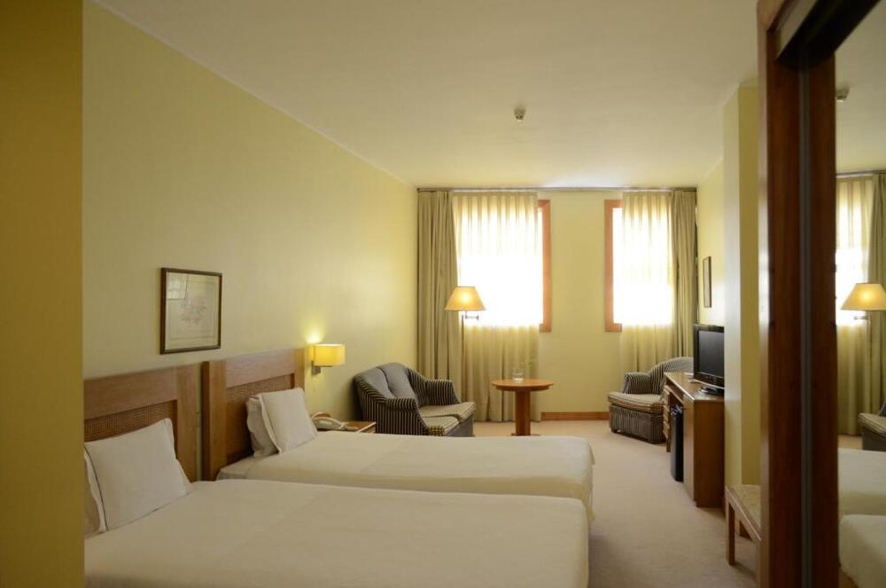Foto de una habitación de Hotel Toural