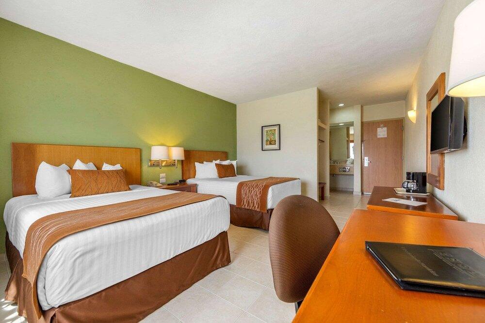 Foto de una habitación de Hotel Comfort Inn Puerto Vallarta