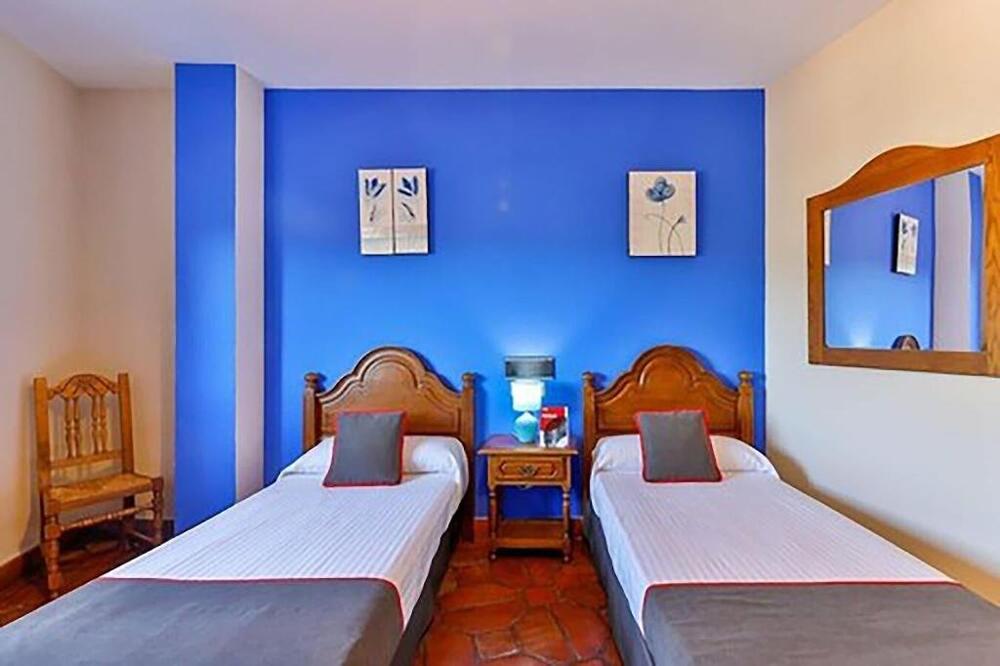 Foto de una habitación de Hostal Alfonso XI