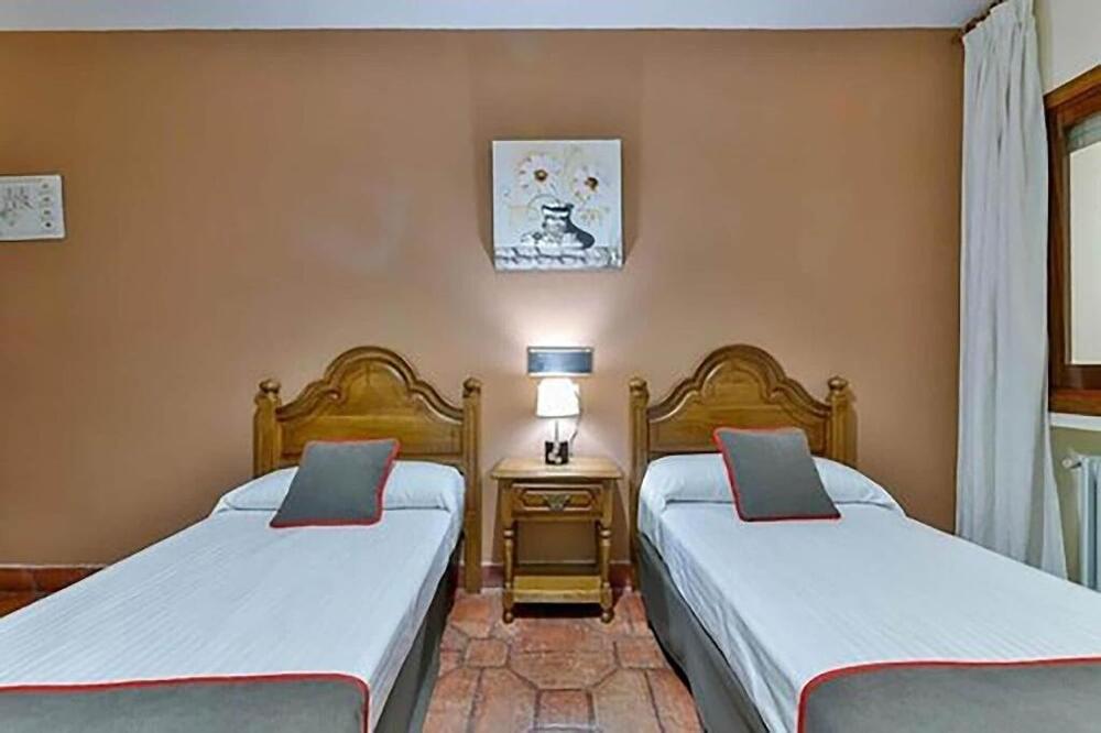 Foto de una habitación de Hostal Alfonso XI