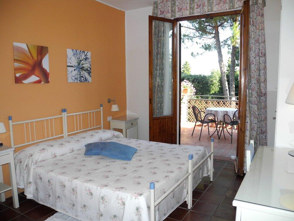 Foto de una habitación de Hotel Le Renaie
