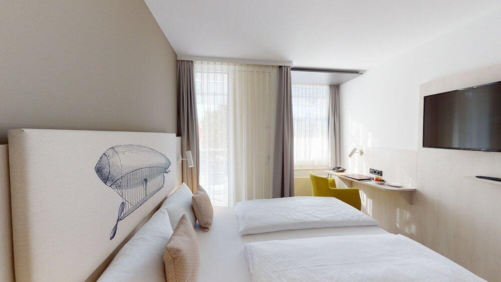 Foto de una habitación de Kongresshotel Potsdam am Templiner See