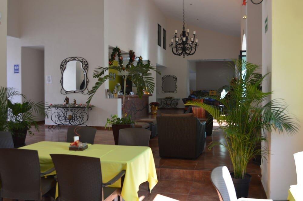Foto de restauración de Concierge Plaza La Villa