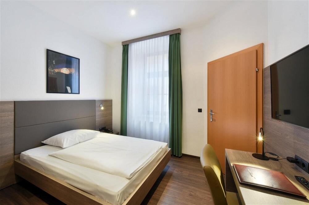 Foto de una habitación de Hotel Lucia