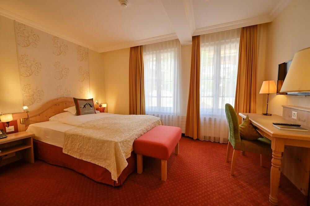 Foto de una habitación de Romantik Hotel Schweizerhof