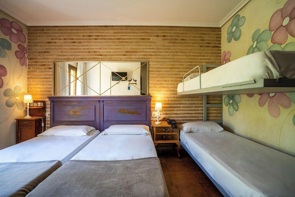 Foto de una habitación de Hostal YIT Puerta Bisagra