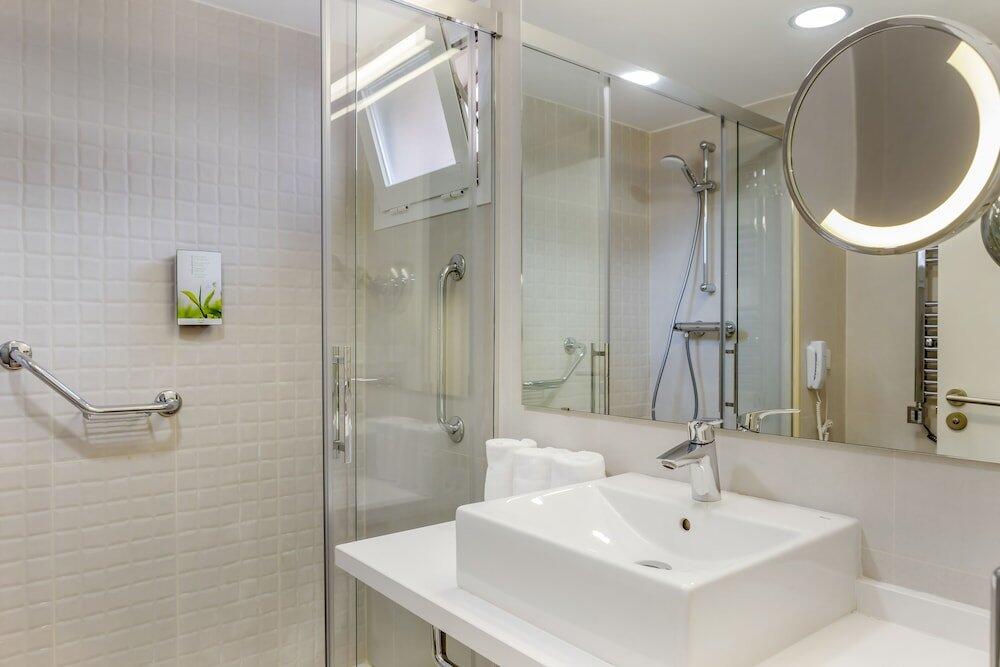 Foto del baño de Aparthotel Los Amigos Beach Club