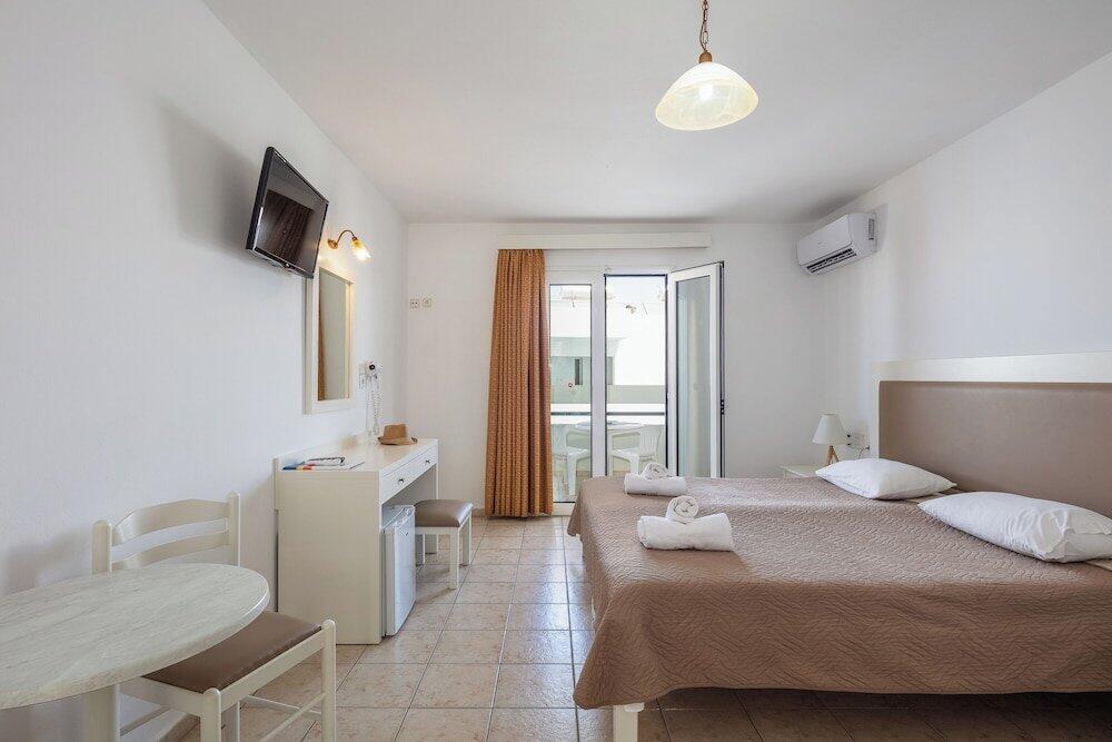 Foto de una habitación de Koni Village Hotel