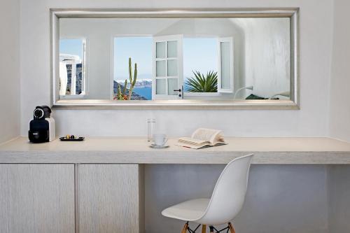 Foto de una habitación de Hotel Porto Fira Suites