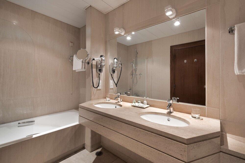 Foto del baño de Hotel NH Lisboa Campo Grande