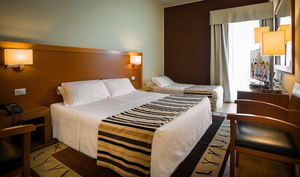 Foto de una habitación de Sardegna Hotel - Suites &amp;amp; Restaurant