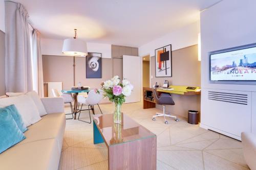 Foto de restauración de Aparthotel Fraser Suites Harmonie Paris La Défense