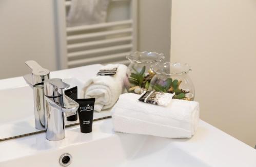 Foto del baño de NEMEA Appart Hotel - Résidence Elypséo