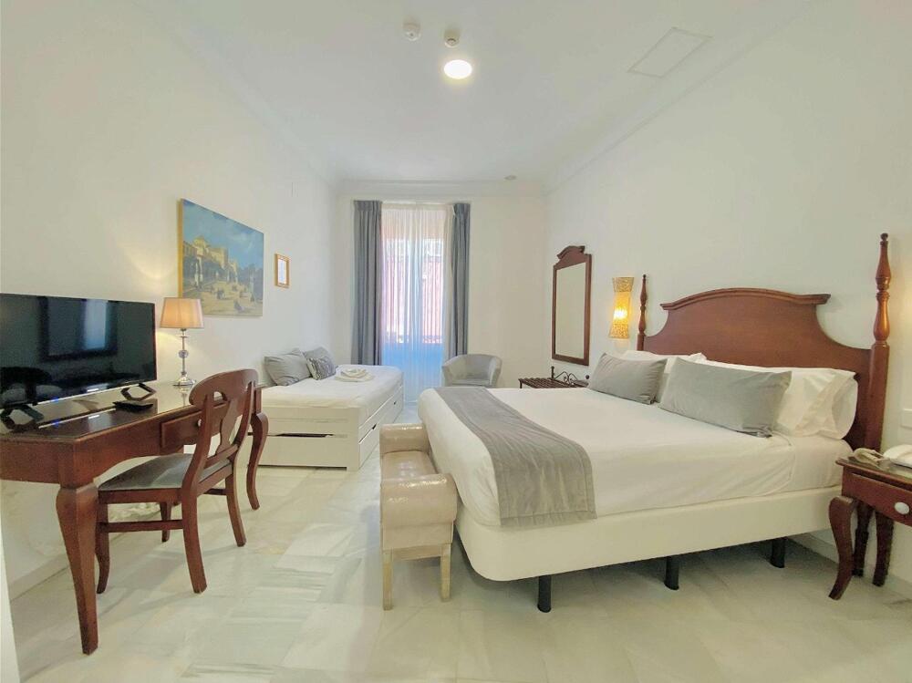 Foto de una habitación de Hotel Las Cortes De Cádiz