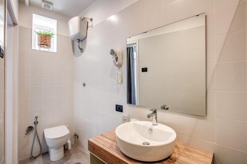 Foto del baño de Hotel King