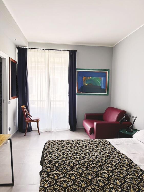 Foto de una habitación de Hotel King
