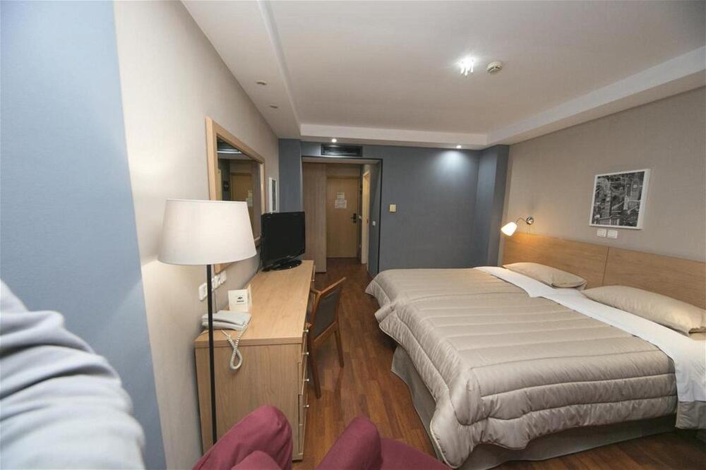 Foto de una habitación de Athina Airport Hotel