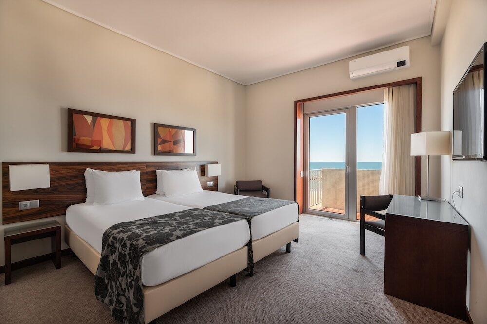 Foto de una habitación de Praiagolfe Hotel