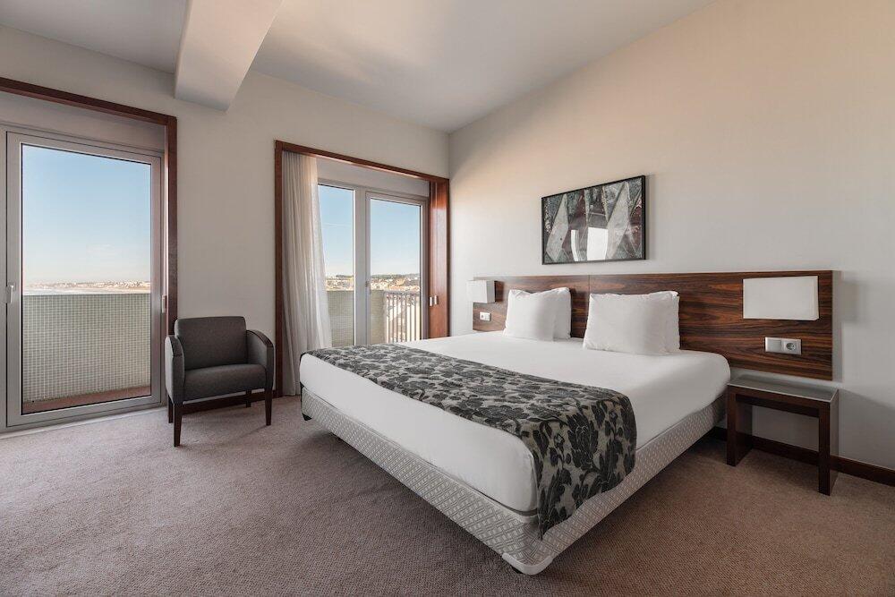Foto de una habitación de Praiagolfe Hotel