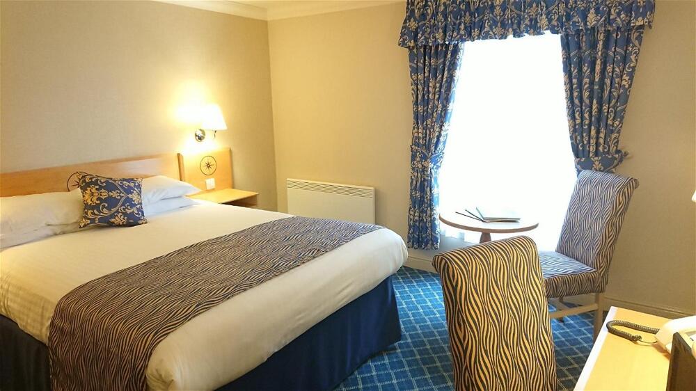 Foto de una habitación de The Queens Hotel