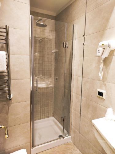 Foto del baño de Hotel Corona D&amp;#039;Italia
