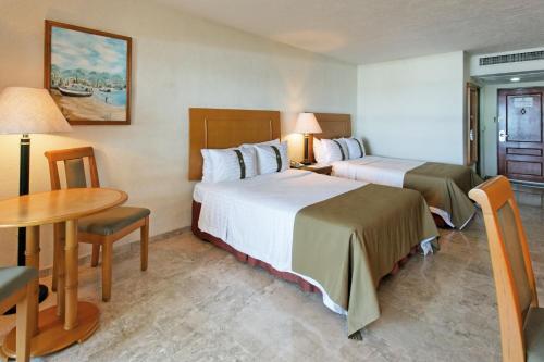 Foto de una habitación de Complejo The Palms Resort of Mazatlan
