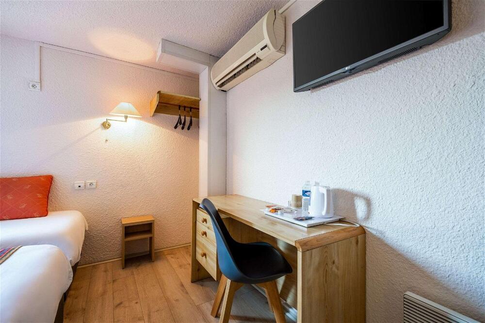 Foto de una habitación de Comfort Hotel Montlucon