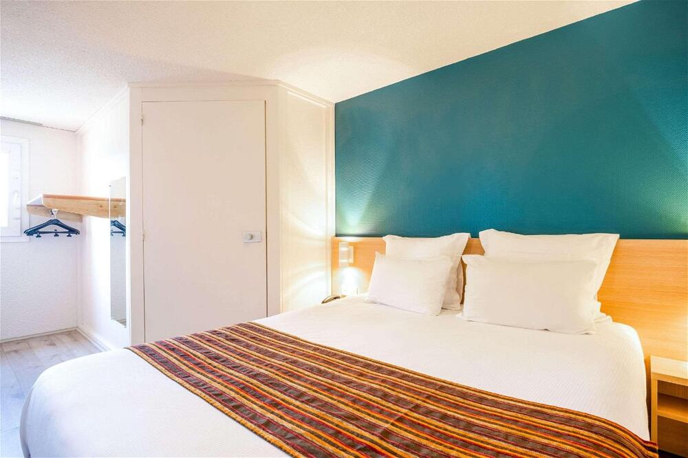 Foto de una habitación de Comfort Hotel Montlucon