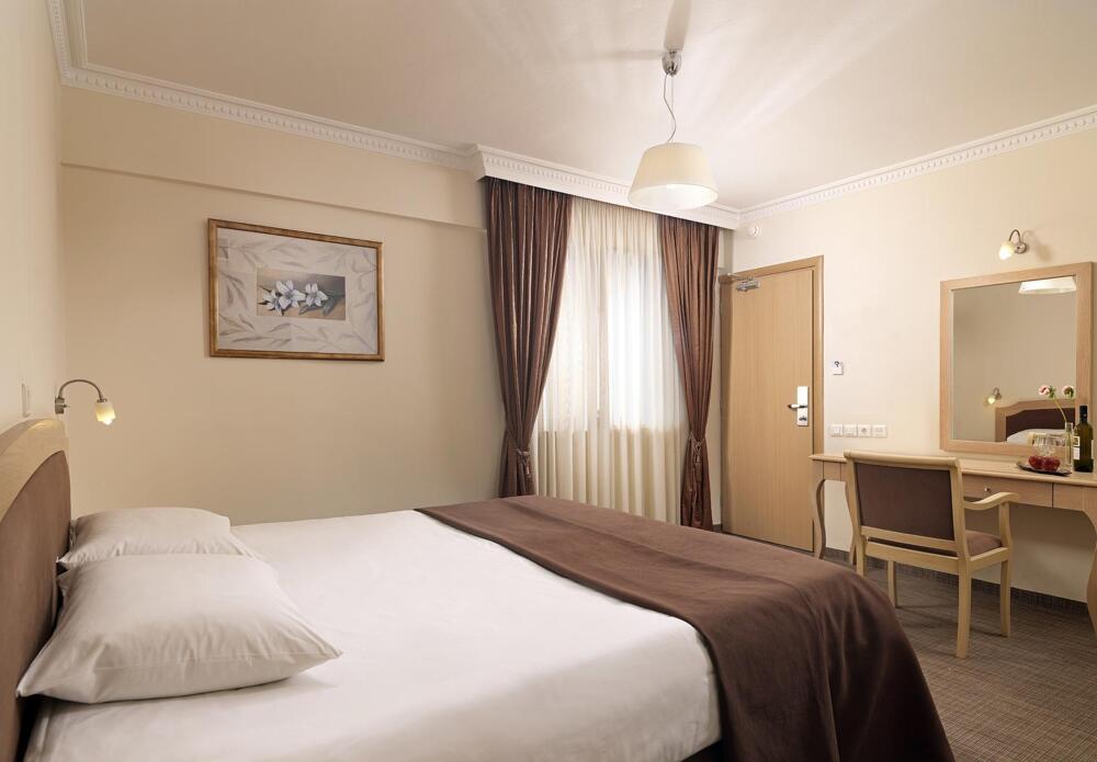 Foto de una habitación de Hotel Airotel Parthenon