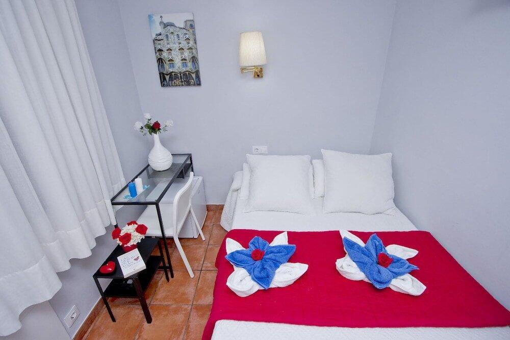 Foto de una habitación de Barcelona City Rooms
