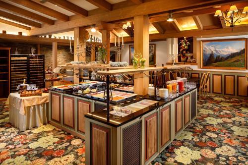 Foto de restauración de Eiger Mürren Swiss Quality Hotel
