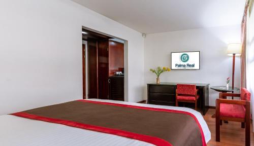 Foto de una habitación de Hotel Palma Real