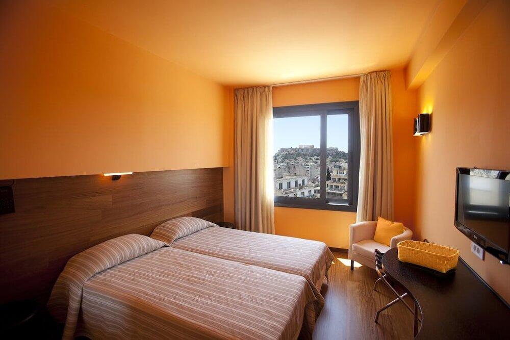 Foto de una habitación de Athens Center Square Hotel