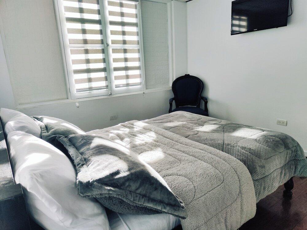 Foto de una habitación de Hotel Muros Quito