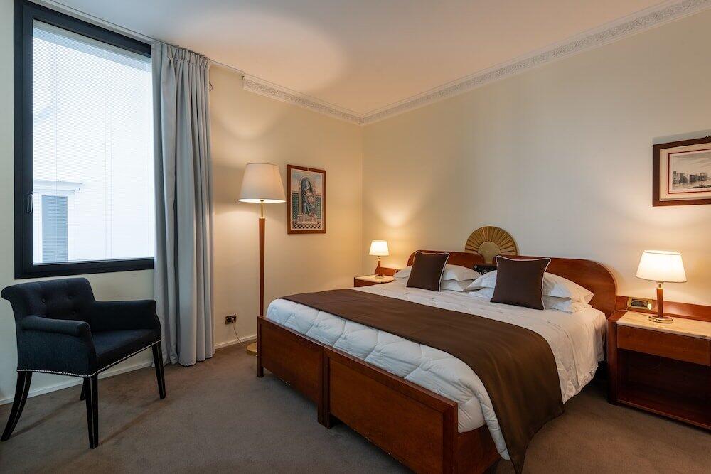 Foto de una habitación de Hotel Roma