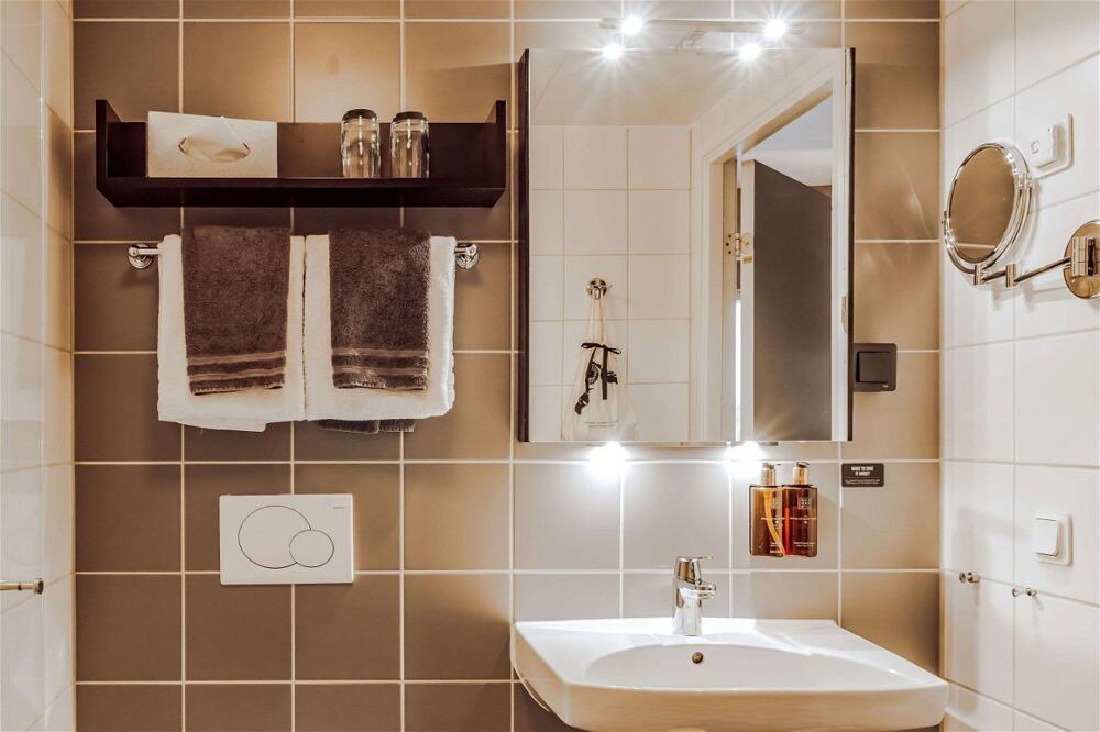Foto del baño de Clarion Collection Hotel Odin
