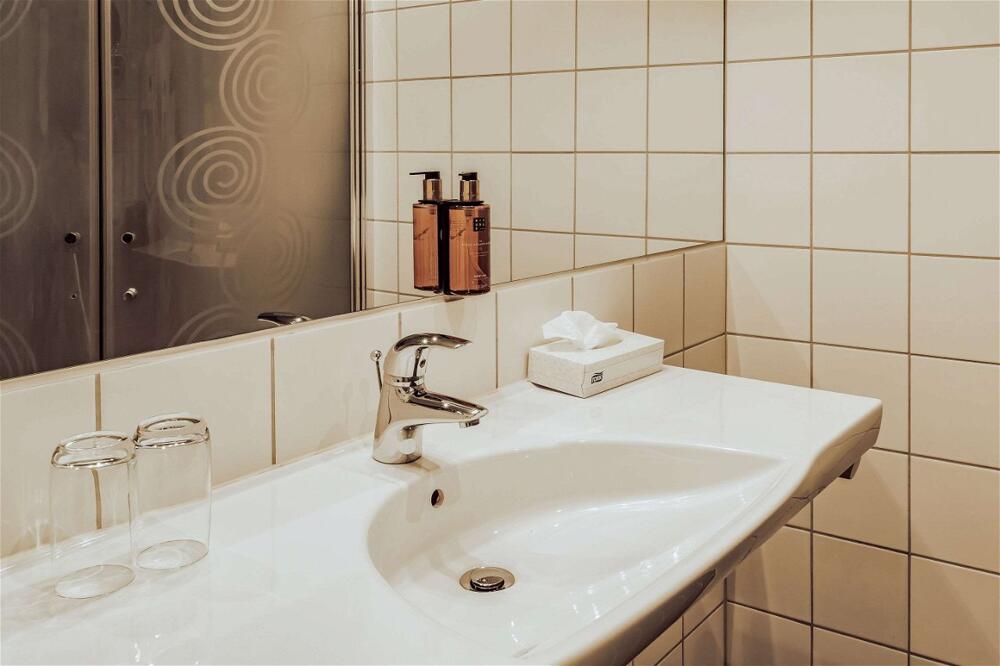 Foto del baño de Clarion Collection Hotel Odin