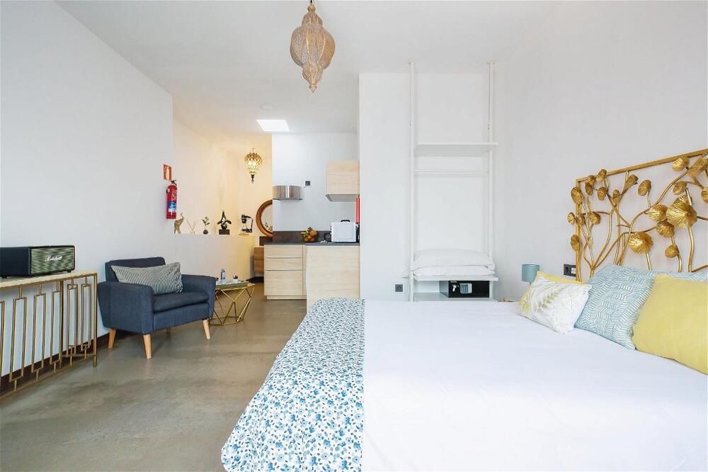 Foto de una habitación de Hotel El Charco Suites