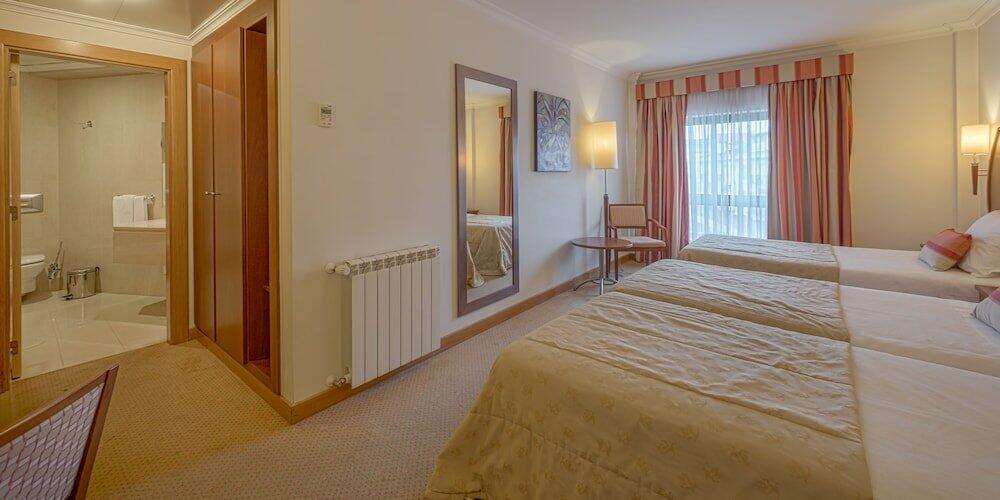 Foto de una habitación de Hotel Cinquentenario &amp;amp; Conference Center