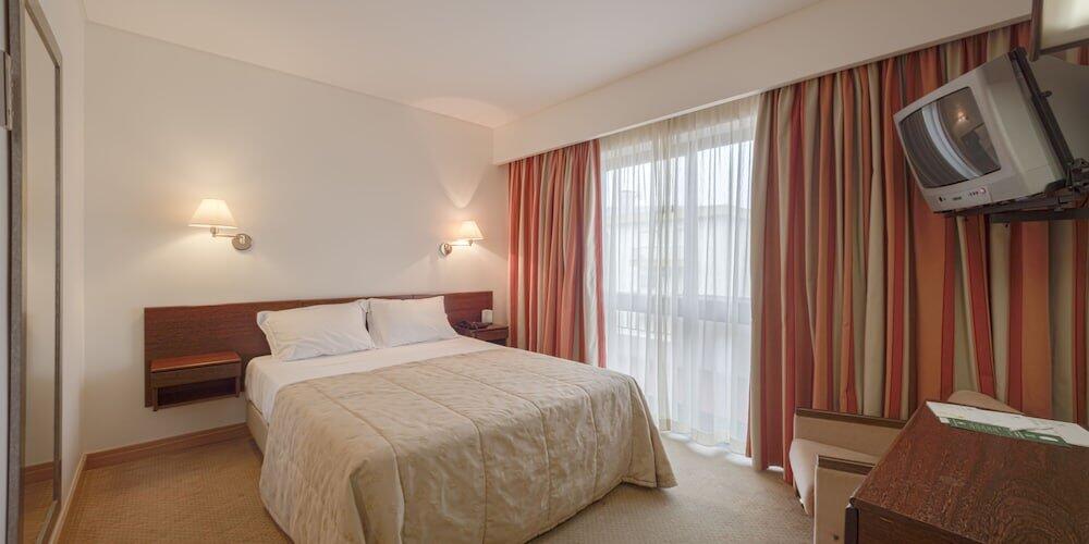 Foto de una habitación de Hotel Cinquentenario &amp;amp; Conference Center