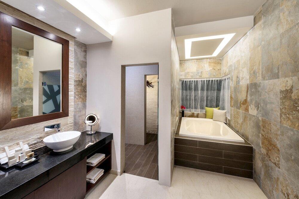 Foto del baño de Complejo Hidden Beach Resort Au Naturel Adults Only - All Inclusive