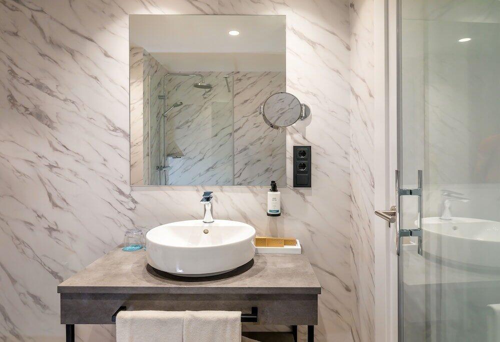 Foto del baño de Hotel Occidental Pamplona
