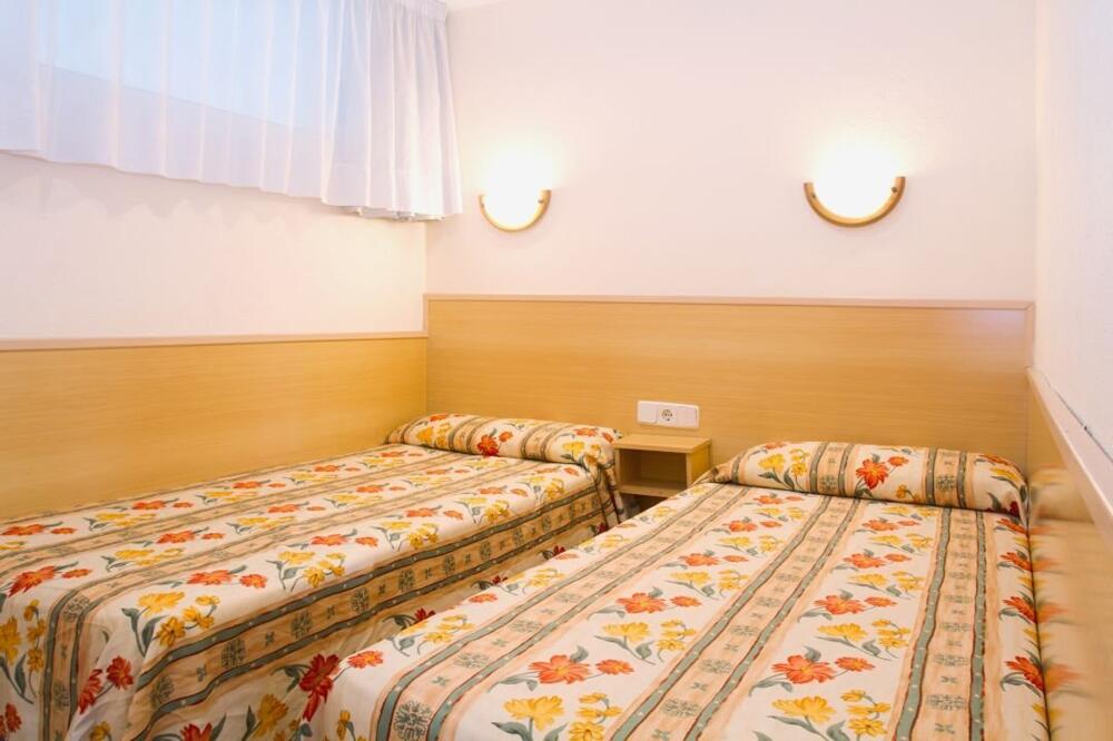 Foto de una habitación de Apartamentos Rentalmar Los Peces