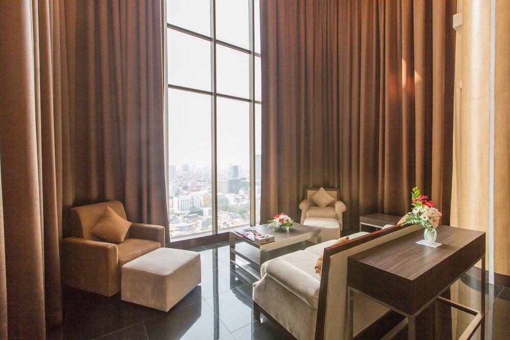 Foto de una habitación de Merlynn Park Hotel