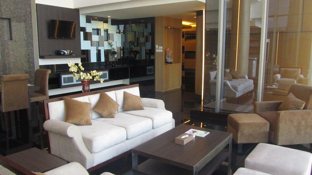 Foto de una habitación de Merlynn Park Hotel