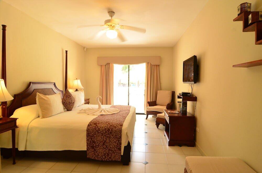 Foto de una habitación de Complejo Cofresi Palm Beach &amp;amp; Spa Resort All Inclusive
