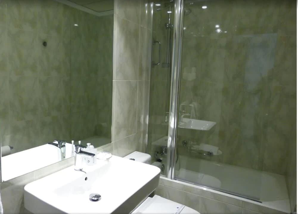 Foto del baño de Hotel Avenida